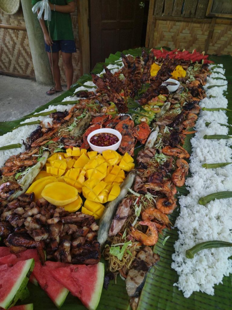 Boodle fight after canyoneering in Kawasan Falls Cebu
