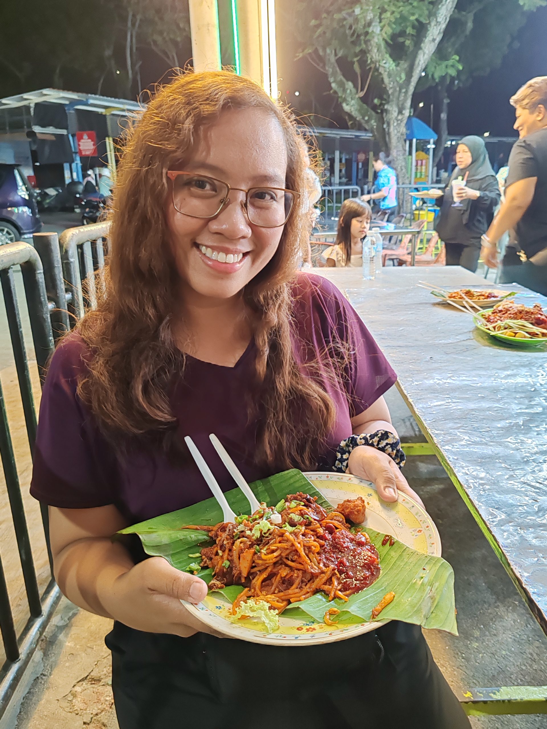Eating street food at Padang Brown