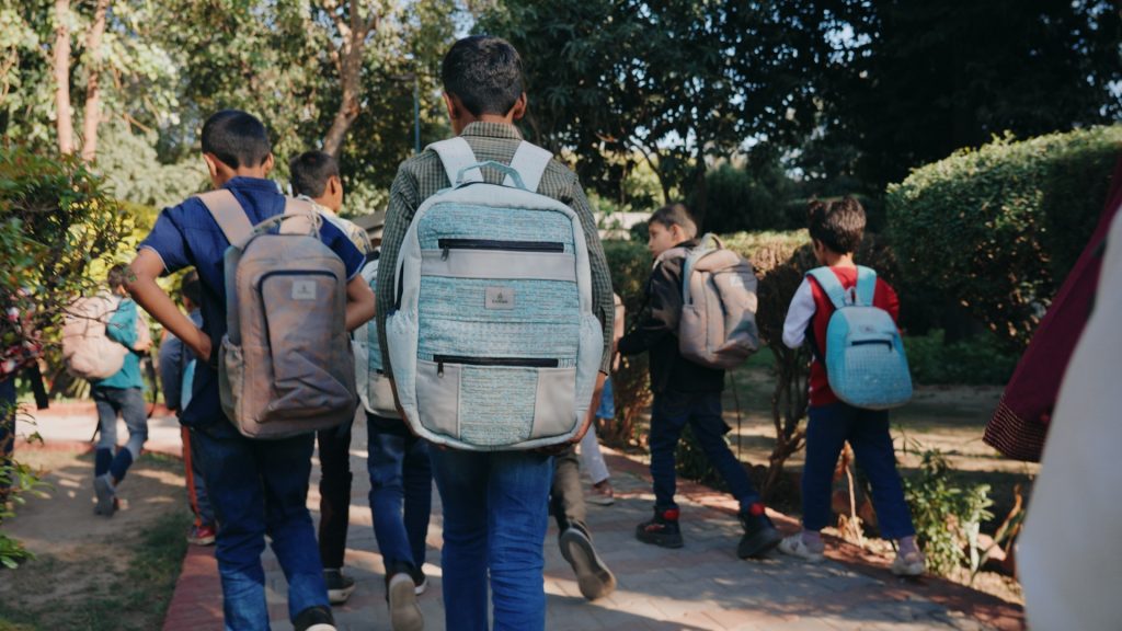 Emirates donates handmade children’s backpacks from upcycled aircraft interiors to children in Asia